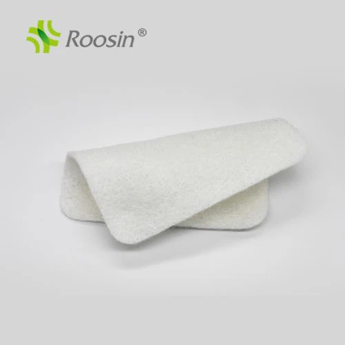 Curativo de alginato de cálcio e sódio